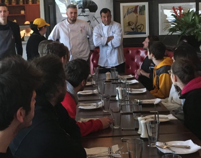 Picture of Avvio's Chef Greg and Chef Kevin with Students