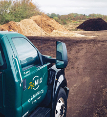 A truck outside a commercial composting facility
