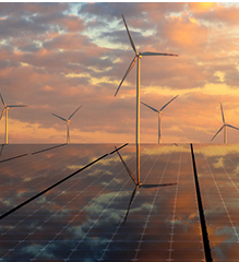 Wind turbines with solar panels in the foreground