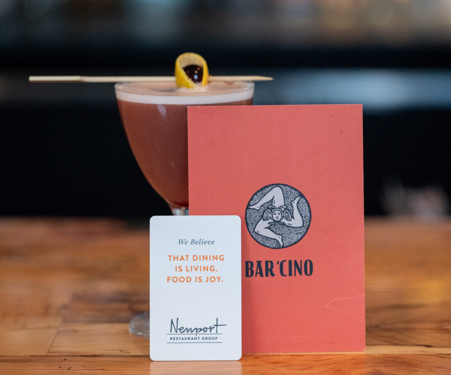 Newport Restaurant Group gift card with a Bar Chino menu and cocktail